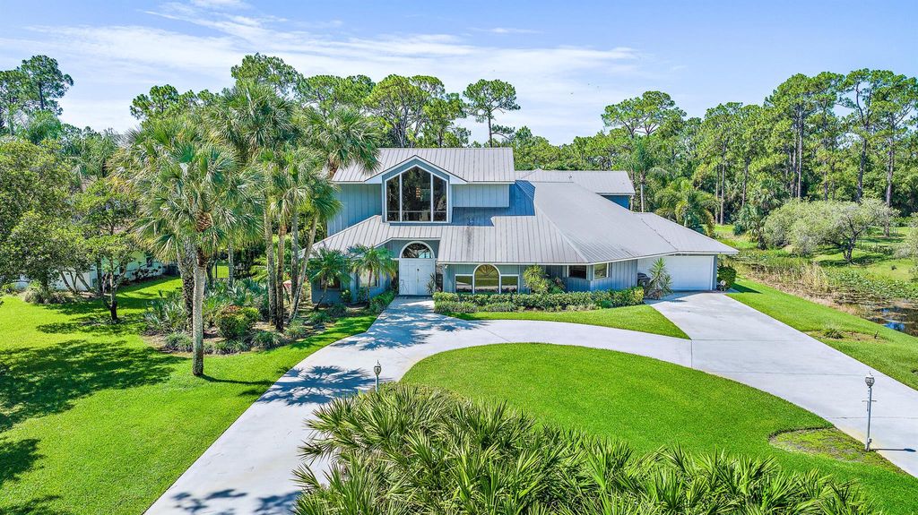 Photo of 10250 Trailwood Circle, Jupiter, FL 33478 (MLS # R10895725)