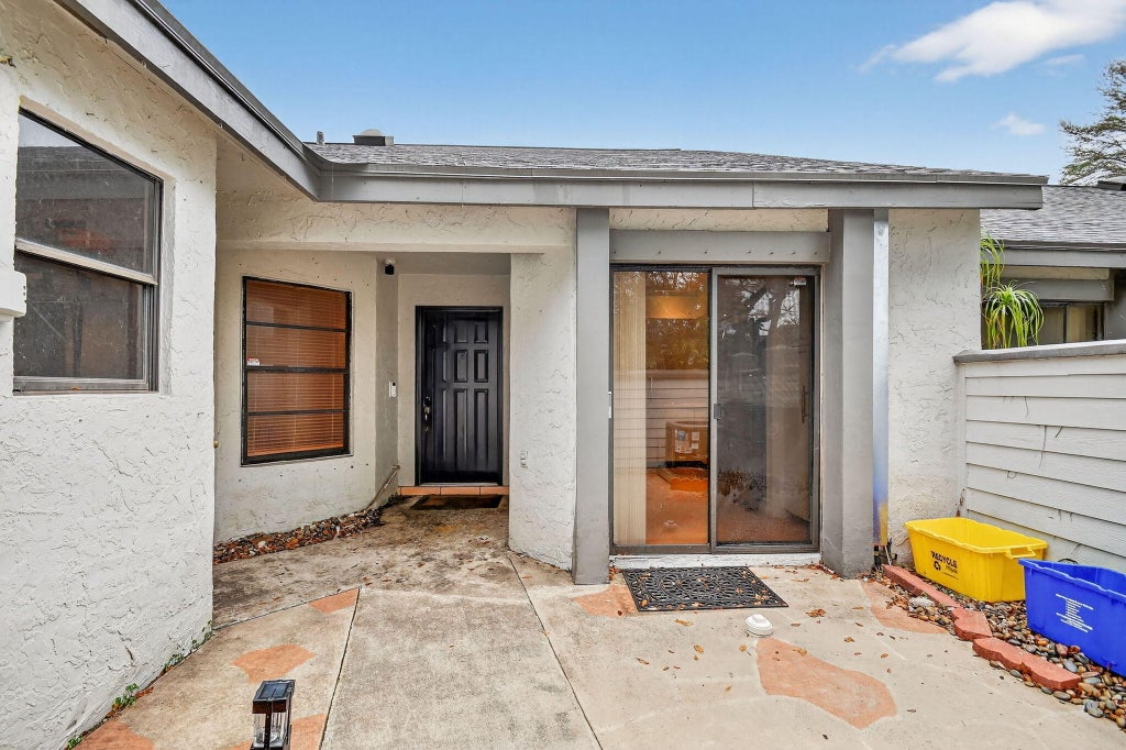 Photo of 2303 Landings Boulevard, Greenacres, FL 33413 (MLS # B26082762)