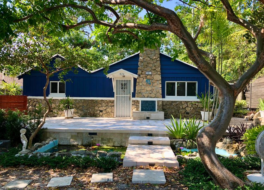 Beautifully redone historical Casita with 2br/1ba in Northwood Hills Historic District. Great outdoor space. Incredible wood finishes with hard wood floors. Stone-finished fireplace. Charming architecture and interior finishes. Amazing landscaping. Updated windows. Washer and Dryer. Central A/C. Fenced in property. Gorgeous community near downtown Northwood and downtown WPB close to everything! Additional street parking.