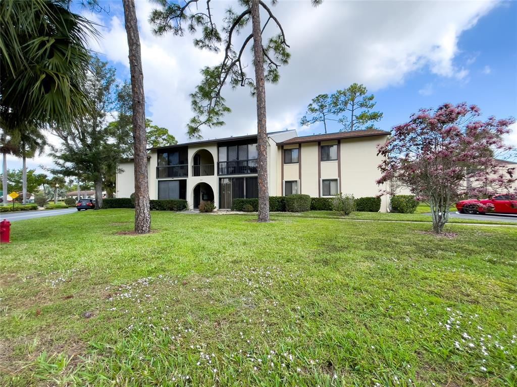 Photo of 301 Knotty Pine Circle #D2, Greenacres, FL 33463 (MLS # B26005352)