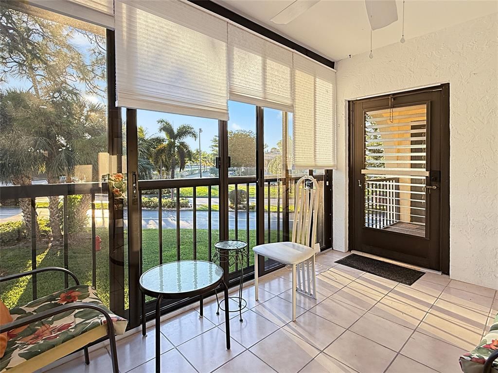 Photo of 301 Knotty Pine Circle #D2, Greenacres, FL 33463 (MLS # B26005352)