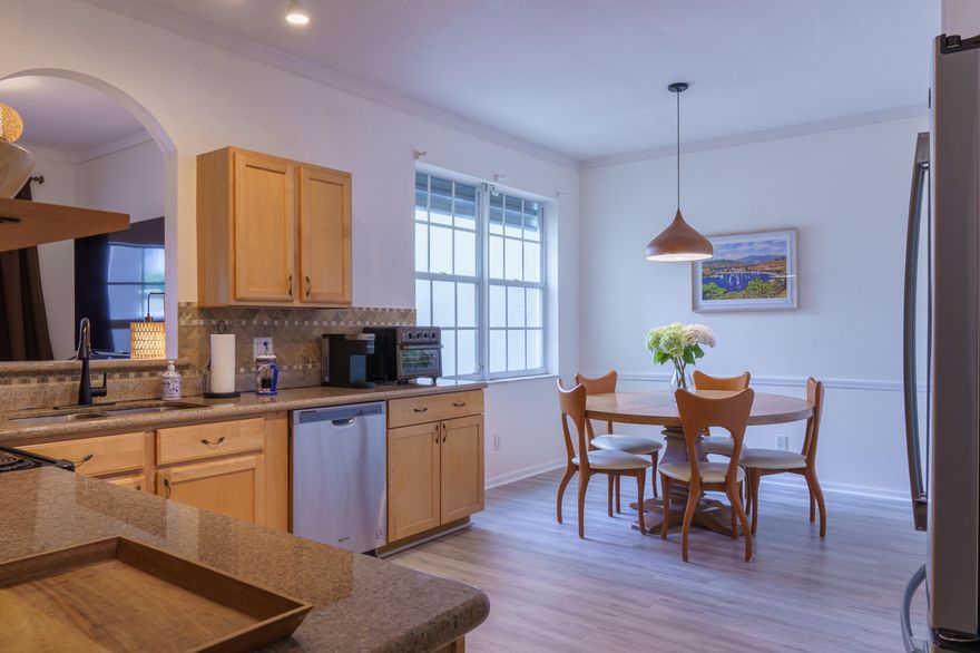 Charming Key West style townhome in one of Coral Springs most sought after communities, surrounded by lush parks and green spaces. This bright 3BR/2.5BA home features a screened front porch, crown molding, and an open layout perfect for Florida living. The upgraded kitchen boasts granite countertops, stainless steel appliances, and a sunny breakfast area. Upstairs offers a flexible loft, three generous bedrooms, and a primary suite with updated bath and walk in closet. Rear entry 2 car garage and brand new washer and dryer included. Beautifully landscaped community with pool, park, and playground. Top rated schools including MSD High School, plus shopping, dining, and recreation just minutes away. Don't miss this one!