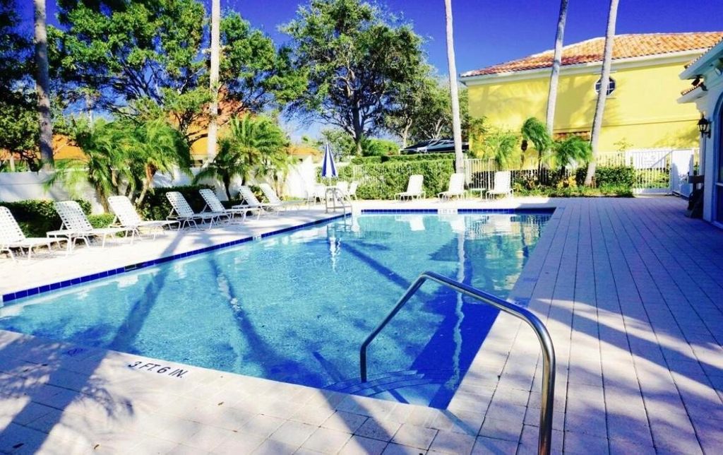 Photo of 63 Tall Oaks Circle, Tequesta, FL 33469 (MLS # R11133116)