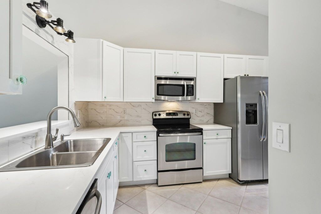 Photo of 4464 NW Oak Branch Court, Jensen Beach, FL 34957 (MLS # R11053015)