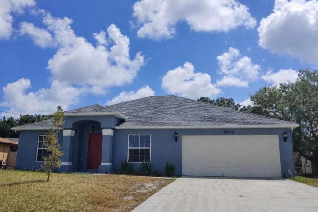 Photo of 1024 SW Estaugh Avenue, Port Saint Lucie, FL 34953 (MLS # R11156062)