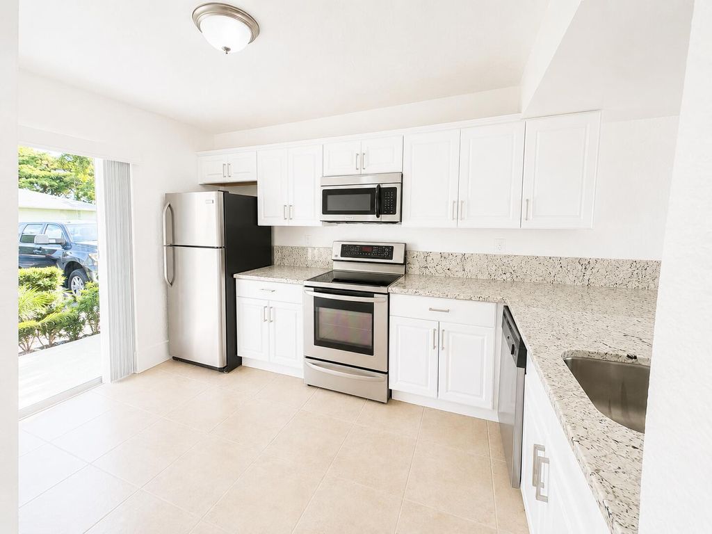 Photo of 887 Crystal Lake Drive, Pompano Beach, FL 33064 (MLS # B26034547)