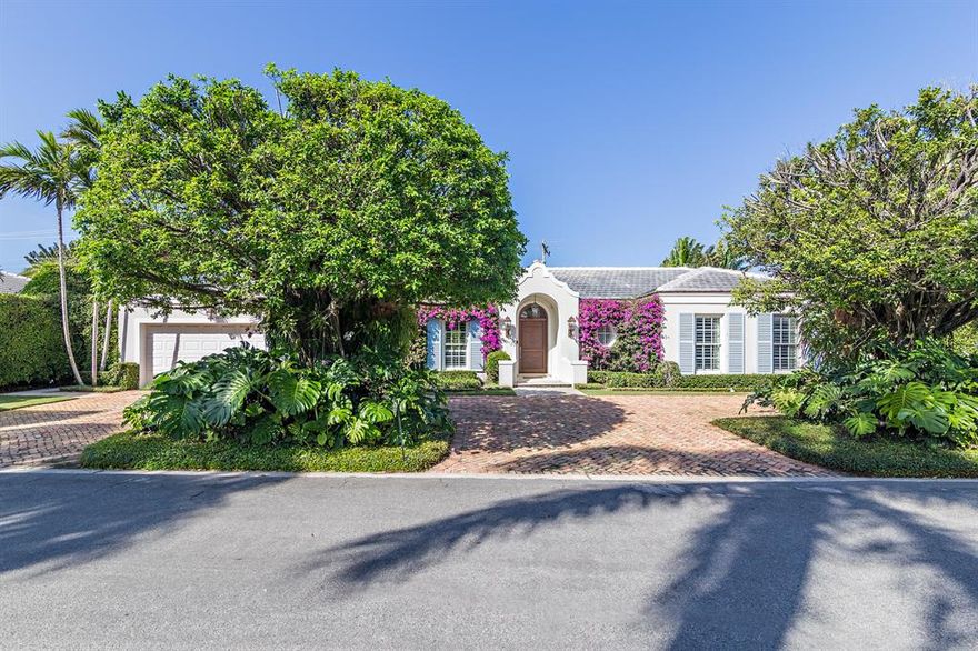 West Indies style home with 3 bedrooms, 3 bathrooms + Den/Office in the highly sought after North End. High ceilings, eat-in kitchen, guest suite, and marvelous covered outside loggia opens to the pool and garden area.  Walking distance to beach and lake trail make this home quintessential palm beach living.