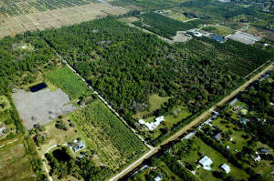 Fantastic business opportunity to develop or subdivide this 80 acre parcel. A quick 8 miles to the Winter Equestrian Festival, Global Dressage, and the International Polo Club. House situated on 5 improved acres with a pond. 75 remaining acres are unimproved and can be easily subdivided by buyer. Acreage total is 80 Acres. Land divided into 6 separate parcel control numbers. Parcel control numbers:41-41-43-07-00-000-5080, 41-41-43-07-00-000-5090, 41-41-43-07-00-000-5100, 41-41-43-07-00-000-5110, 41-41-43-07-00-000-5020, 41-41-43-07-00-000-5070