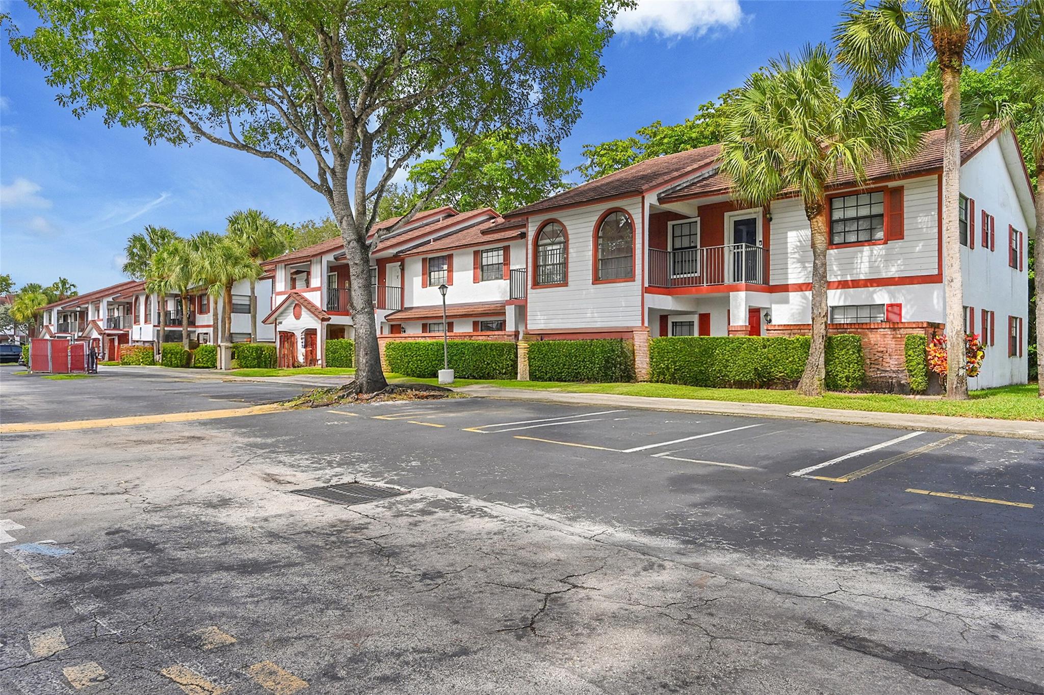 Welcome to this charming and immaculate 2-bedroom, 2-bathroom condo in the heart of Coral Springs! This updated home features new carpeting in the spacious bedrooms, gorgeous tile and laminate flooring in the living areas, and a large kitchen with an eat-in area, stainless steel appliances, ample counter space, and beautiful cabinetry. Both bathrooms are tastefully updated, offering a clean and modern feel. Enjoy the private screened-in patio, perfect for relaxing. Located in the desirable Beacon Place community with a sparkling pool. Close to shopping, dining, great schools, and more!