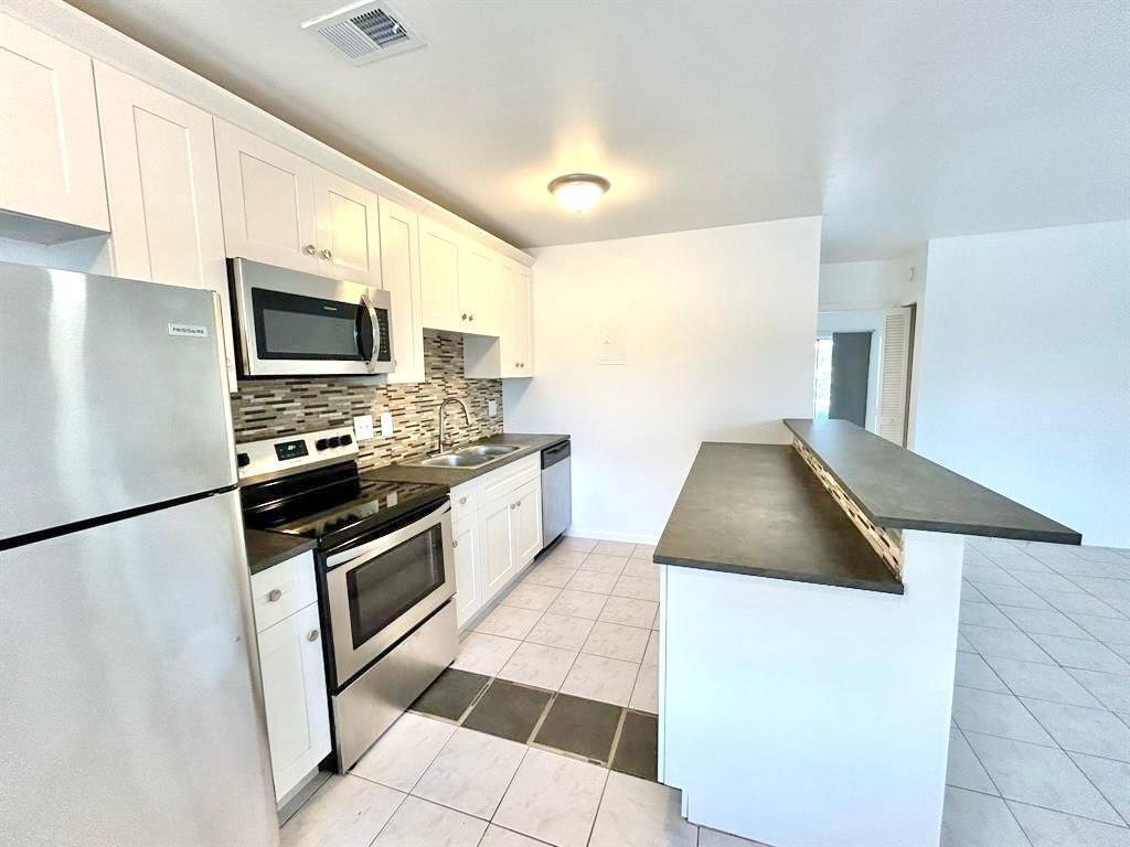 1004 PINE DRIVE CONDO - Residential Lease