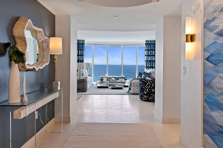 Spectacular 14th floor 3 bedroom corner Savona model with ocean views from every room.  Newly renovated and redesigned by Clive Daniels Homes with inspiration taken from the beauty of the Florida shoreline.From the moment you step through the door, you are transported to a modern beach getaway.  The great room facing the ocean has white sandstone marble floors which run throughout the unit. There's also a cozy entertainment corner with new electric fireplace and TV monitor.  New draperies have been installed in the kitchen, great room and primary bedroom.  Other recent upgrades include:  new vanities and fixtures in all baths; LED high-hats, sconces and ceiling light fixtures;  Sonos sound system throughout unit; Lutron system to control lighting through a mobile app; and more...