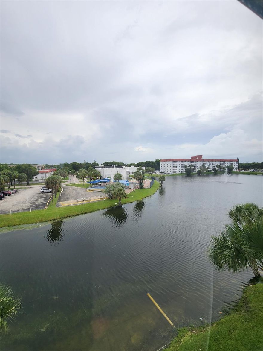 Welcome to this beautiful unit in Castle Gardens #14. This 1 bedroom 1.5 bathroom 4th floor condo features ceramic tile flooring throughout, and is fully furnished ready to move in. Experience this great location in a peaceful area while you enjoy your water lake view from every window. The unit features a spacious bedroom and walk-in closet, along with an enclosed patio. Enjoy your updated kitchen with granite countertops, and plenty of cabinets for storage. This is situated in an active 55+ community with clubhouse, bus service for grocery shopping, 3 heated pools, bbq picnic area, billiard room, 2 bowling ales, shuffleboard, gym and more. Broward transit in-front of your condo as well. One parking spot assigned. Centrally located to to shops and restaurants. Association says 55+