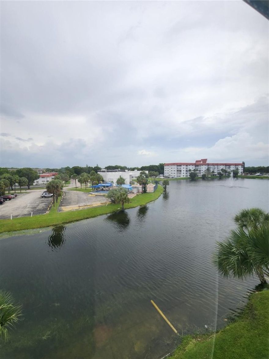 Welcome to this beautiful unit in Castle Gardens #14. This 1 bedroom 1.5 bathroom 4th floor condo features ceramic tile flooring throughout, and is fully furnished ready to move in. Experience this great location in a peaceful area while you enjoy your water lake view from every window. The unit features a spacious bedroom and walk-in closet, along with an enclosed patio. Enjoy your updated kitchen with granite countertops, and plenty of cabinets for storage. This is situated in an active 55+ community with clubhouse, bus service for grocery shopping, 3 heated pools, bbq picnic area, billiard room, 2 bowling ales, shuffleboard, gym and more. Broward transit in-front of your condo as well. One parking spot assigned. Centrally located to to shops and restaurants. Association says 55+