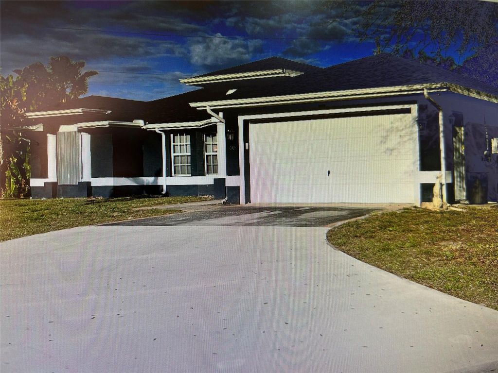 Photo of 102 SW Bedford Road, Port Saint Lucie, FL 34953 (MLS # F10485254)