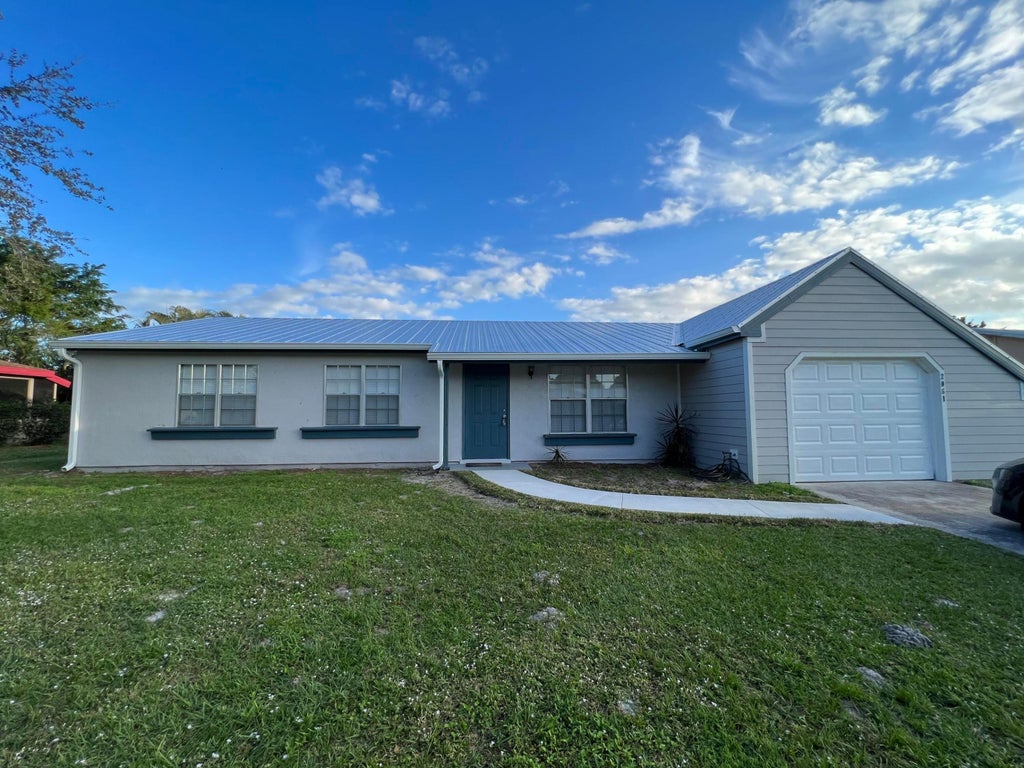 Photo of 2061 SE Hideaway Circle, Port Saint Lucie, FL 34952 (MLS # R10951763)