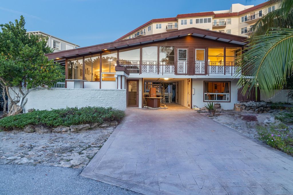 Photo of 3490 S Ocean Boulevard, South Palm Beach, FL 33480 (MLS # R11147228)