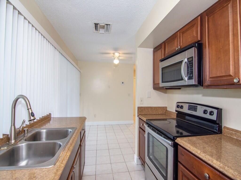 Photo of 650 SE Evergreen Terrace, Port Saint Lucie, FL 34983 (MLS # R10948035)