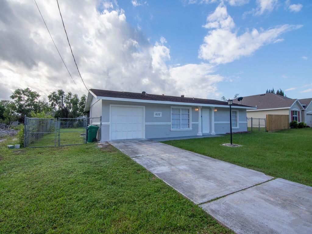 Photo of 650 SE Evergreen Terrace, Port Saint Lucie, FL 34983 (MLS # R10948035)