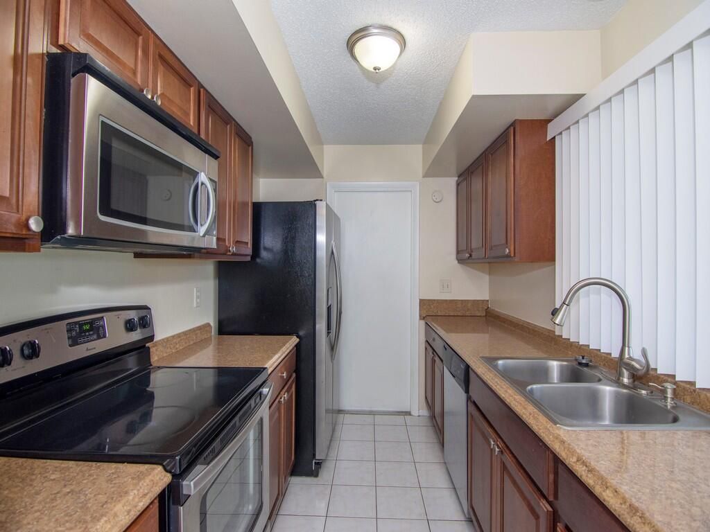 Photo of 650 SE Evergreen Terrace, Port Saint Lucie, FL 34983 (MLS # R10948035)