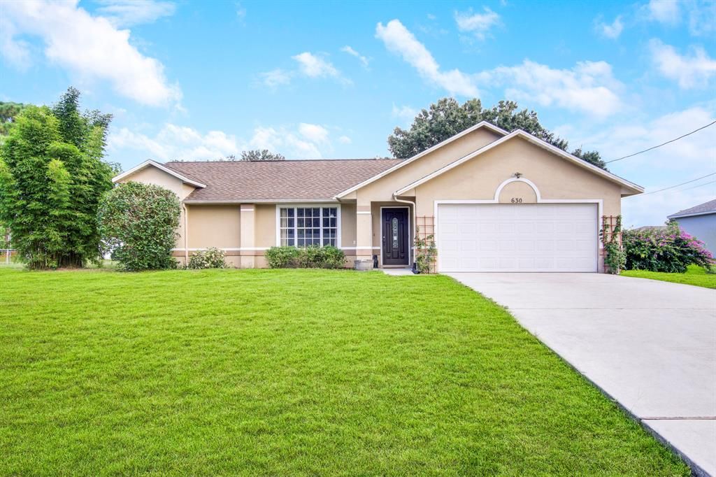 Photo of 630 SW Abraham Avenue Ave, Port St Lucie, FL 34953 (MLS # R10831748)