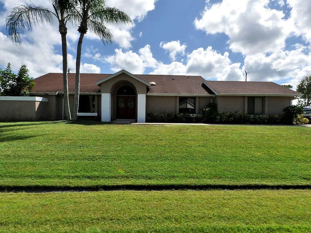 Photo of 6907 NW Hershy Circle, Port Saint Lucie, FL 34983 (MLS # R10942930)