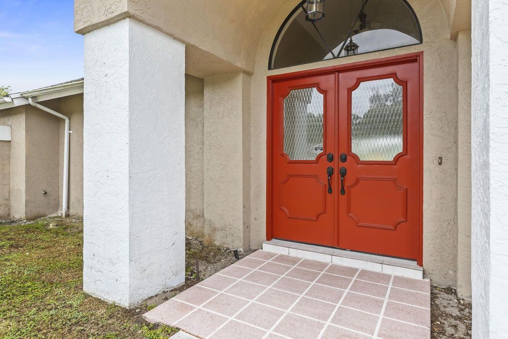 Photo of 6907 NW Hershy Circle, Port Saint Lucie, FL 34983 (MLS # R10942930)