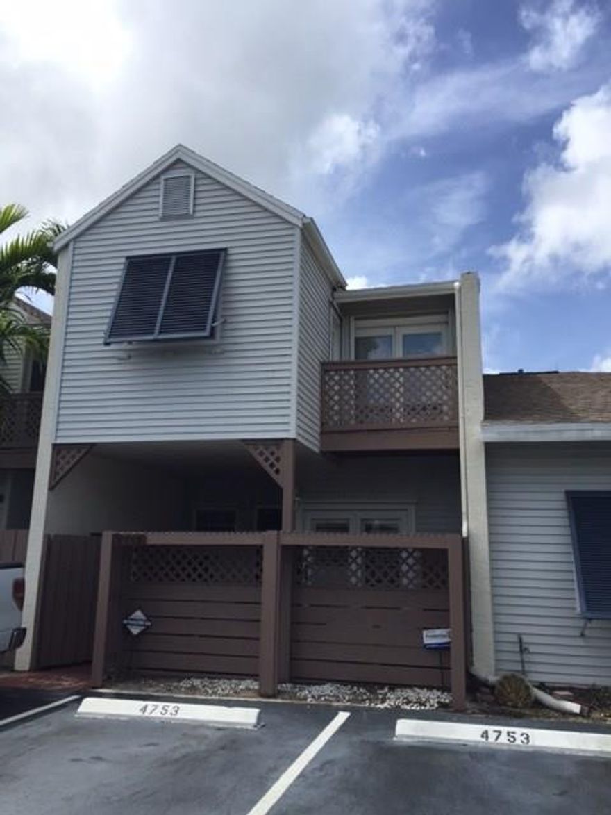 Beautiful townhome community. 3 bedroom 2 1/2 bath townhome with lovely lakeview. Eat in kitchen area. Closed in patio with windows and screens overlooks lake with fountain.  Relax at the community pool. Tile and laminate floors throughout. Plantation shutters on French doors in front and back of downstairs.  AC replaced in March 2016.