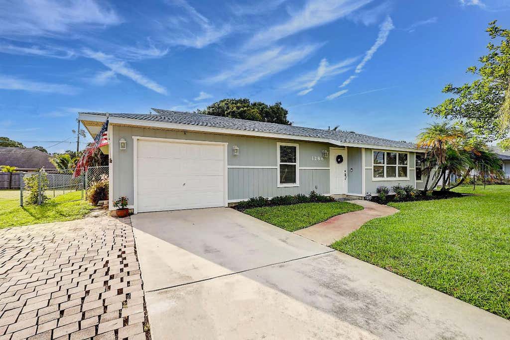 Photo of 1286 SW Cynthia Street, Port Saint Lucie, FL 34983 (MLS # R10933425)