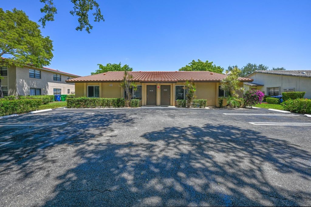 Photo of 10833 NW 45th Street, Coral Springs, FL 33065 (MLS # F10500357)