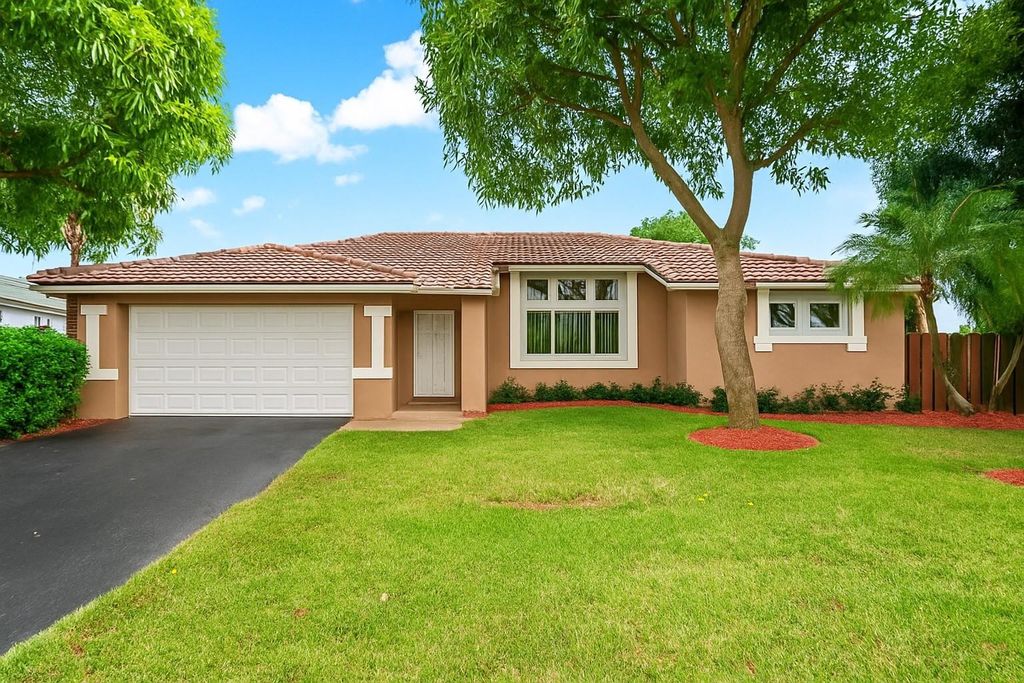 Photo of 9861 NW 28th Place, Coral Springs, FL 33065 (MLS # F10534386)