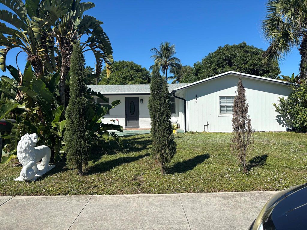 Photo of 417 Lighthouse Drive, Palm Beach Gardens, FL 33410 (MLS # R11141822)