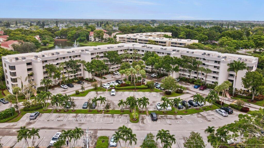 Experience the best of Delray Beach living in this spacious 1BD/1BA top-floor condo. Enjoy lush landscape views from your oversized balcony, designed for privacy and relaxation. The home includes accordion hurricane shutters throughout and the convenience of an in-unit washer and dryer. Perfectly located just 5 minutes from the beach and close to the restaurants, shops, and art scene of East Atlantic Avenue. Community amenities feature a clubhouse with pool, fitness center, and newly renovated tennis and pickleball courts, offering the ultimate in comfort and convenience.