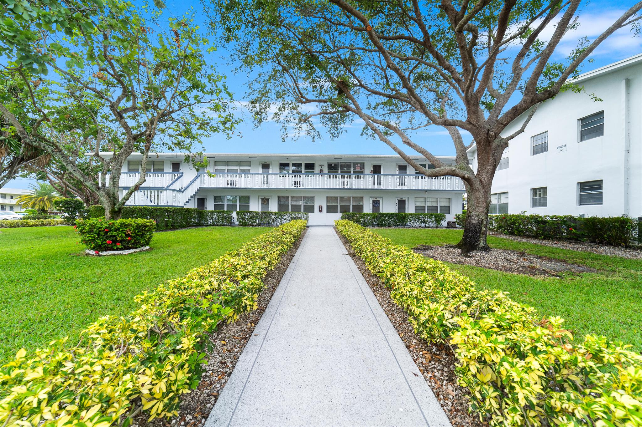 Located in the heart of West Palm Beach, this 55+ bright corner unit offers comfort and convenience in a beautifully maintained gated community. Inside, you'll find a modern kitchen, two full bathrooms, impact windows, and generous storage throughout. Enjoy the fresh air from your covered balcony, just moments away from the pool, bus stop, assigned parking, and laundry. The community features a variety of amenities including a local shuttle, fitness classes, card room, live shows, and more. Easy access to shopping, dining, and everyday essentials completes the package. Schedule your showing today!