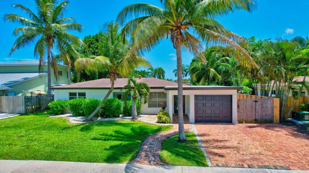 Photo of 334 NE 28th Road, Boca Raton, FL 33431 (MLS # B26059552)