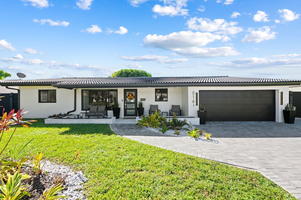 Photo of 5161 NE 18th Terrace, Fort Lauderdale, FL 33308 (MLS # B26093443)