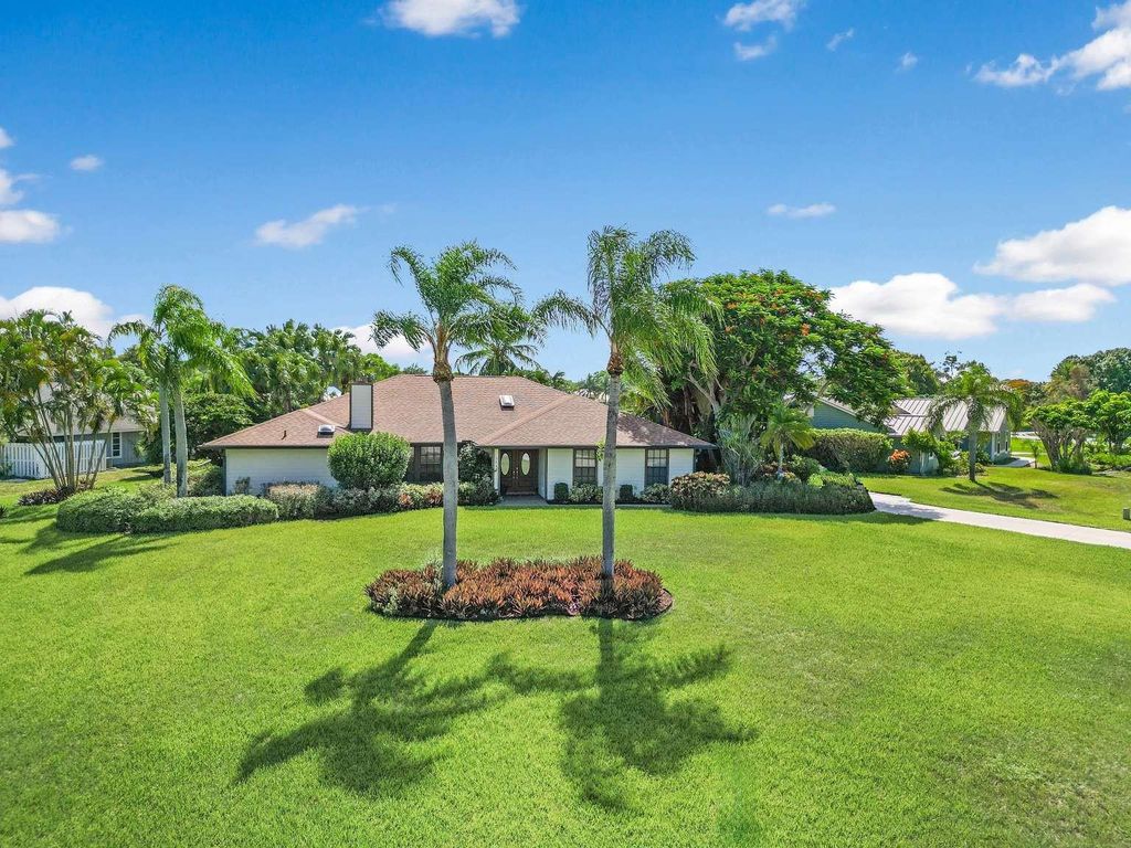 Photo of 3043 NE Ivy Lane, Jensen Beach, FL 34957 (MLS # F10457876)