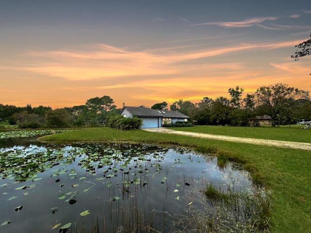 Photo of 16669 131st Way N, Jupiter, FL 33478 (MLS # R10949715)