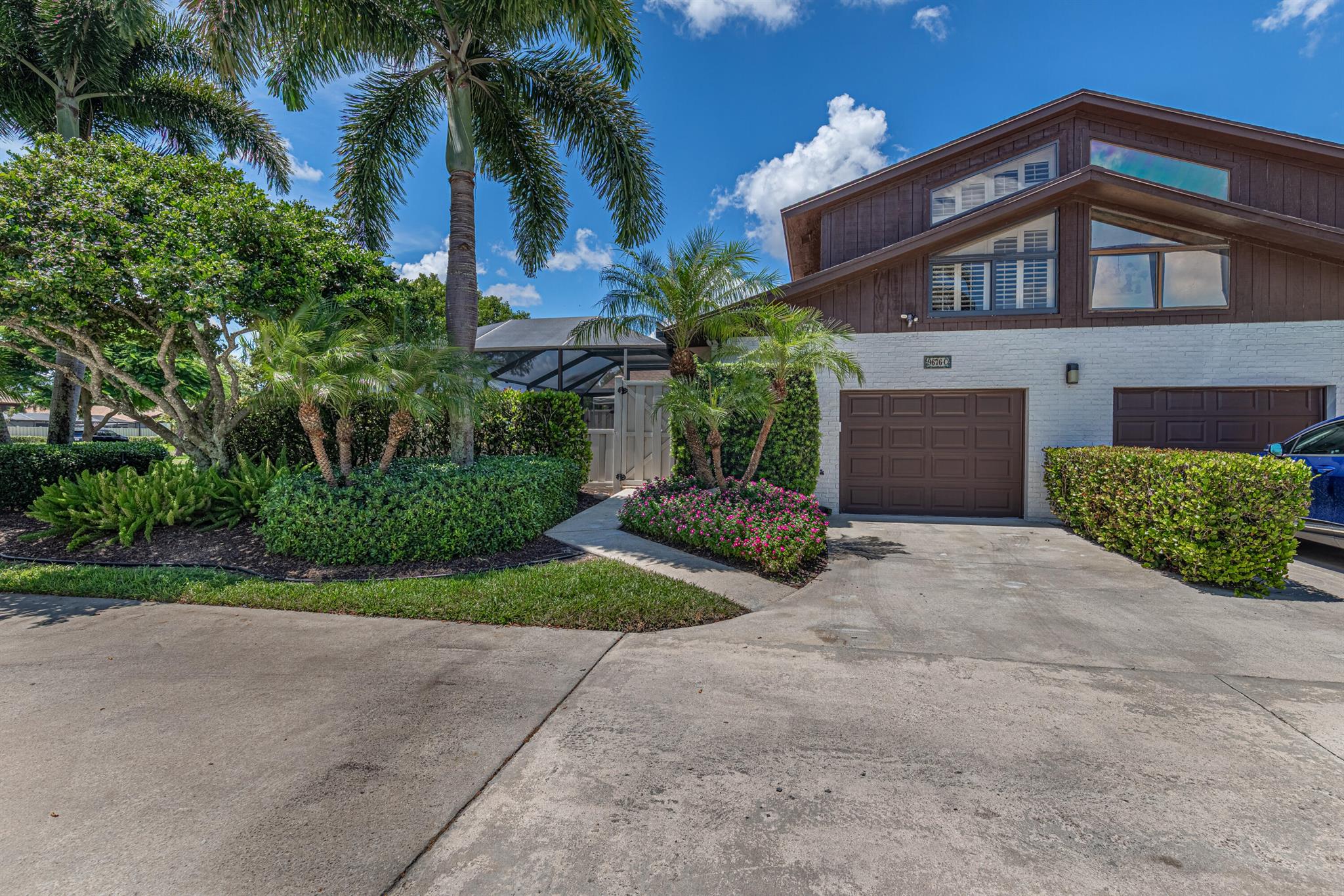 OPEN HOUSE SUNDAY , AUGUST 17 12-2PM. Move-In Ready Townhouse in Boca Gardens with Scenic Lake Views!RARE BEST OF THE BEST POOL HOME!Welcome to this charming 3-bedroom, 3-bathroom townhouse with pool in the highly desirable Boca Gardens community and one of the most desired ''Azalea'' models. Featuring 1,325 sq. ft. of interior living space plus an additional 800 sq. ft. of private, screened-in outdoor living area, this home offers a well-laid-out floor plan perfect for everyday living and entertaining.The open concept showcases beautiful, easy-to-maintain tile flooring throughout the main living areas downstairs and laminate in the 3 bedrooms with a thoughtfully designed kitchen and a comfortable flow throughout.Each bedroom features its own en-suite bathroom for added privacy