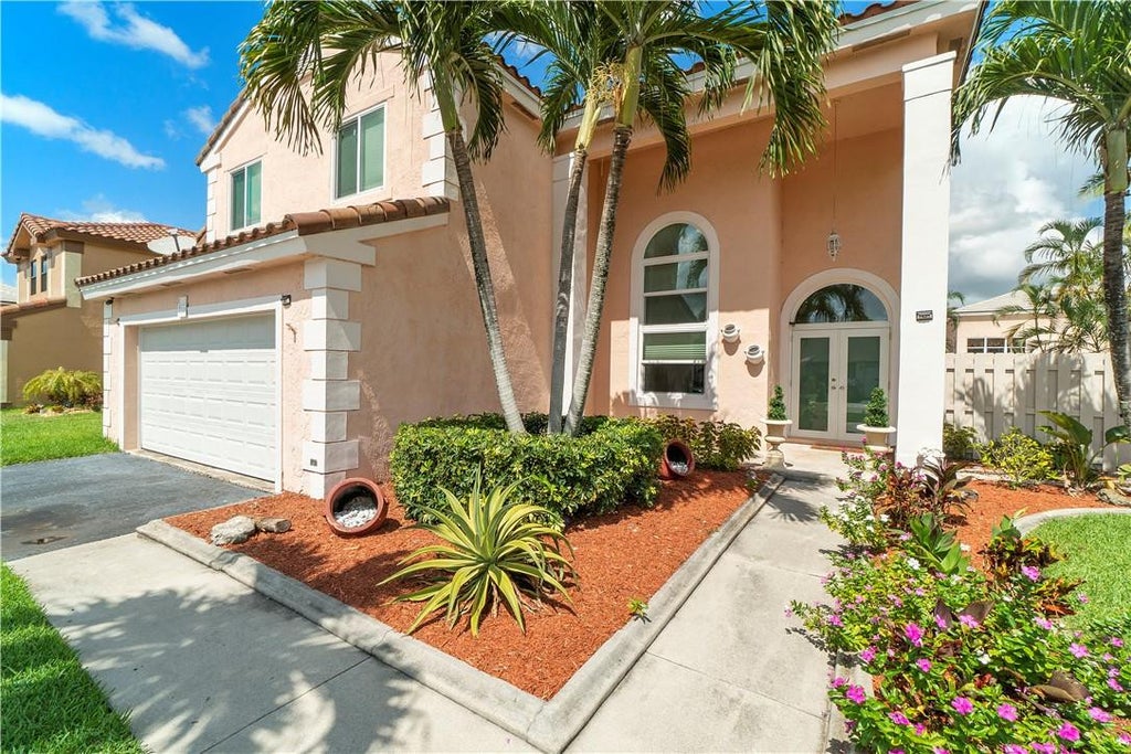 Photo of 710 Briarwood Terrace, Davie, FL 33325 (MLS # B26075171)