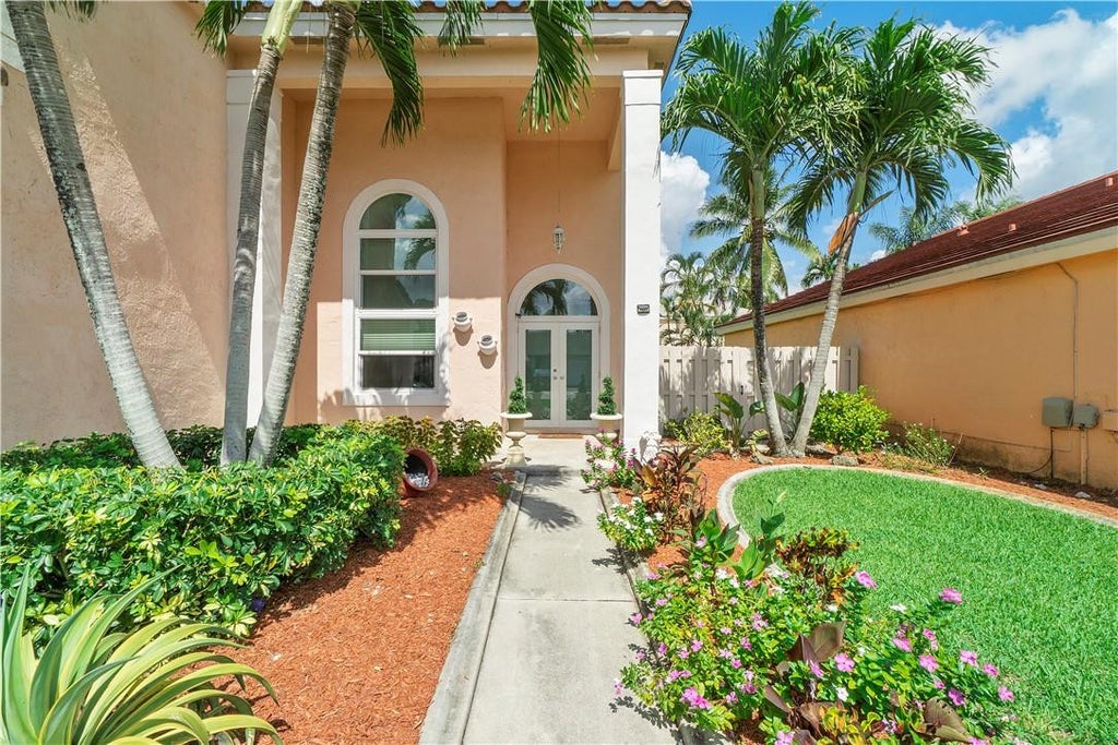 Photo of 710 Briarwood Terrace, Davie, FL 33325 (MLS # B26075171)