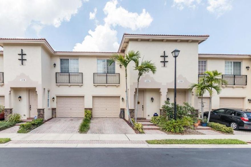 Spacious 2 level town-home in East Delray Beach!  Built by Lennar, Village at Swinton Square features community pool, gym and play area with side walks thru the neighborhood.  This 3 bedroom 2 &1/2 bath home has a one car garage and patio off the Living area. Upstairs you have 3 bedroom including the spacious Master with walk-in closet and large master bath with dual sinks, separate tub and shower.  The other 2 bedrooms are good size & you have another full bath.  Main level has 1/2 bath, Kitchen with wood cabinets, granite counters, SS appliances & breakfast bar,  Living room and dining room along with laundry & large storage closet.  AC is new and Microwave a few years old.  Home has all impact windows.  Great home in a Great location!