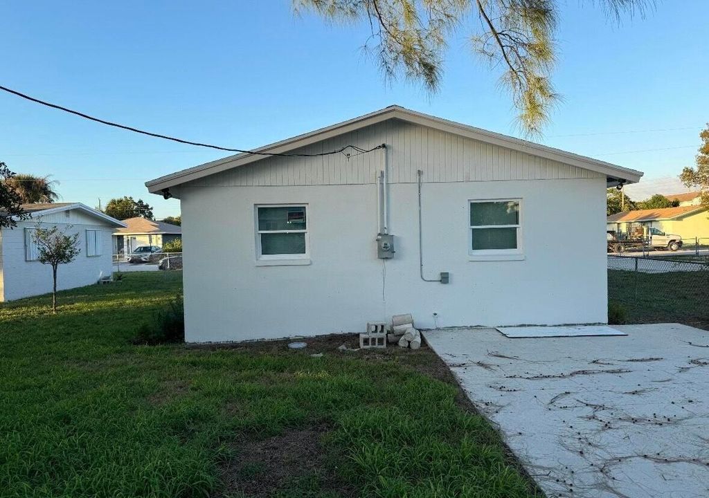 Photo of 1341 W 32nd Street, Riviera Beach, FL 33404 (MLS # R11134895)