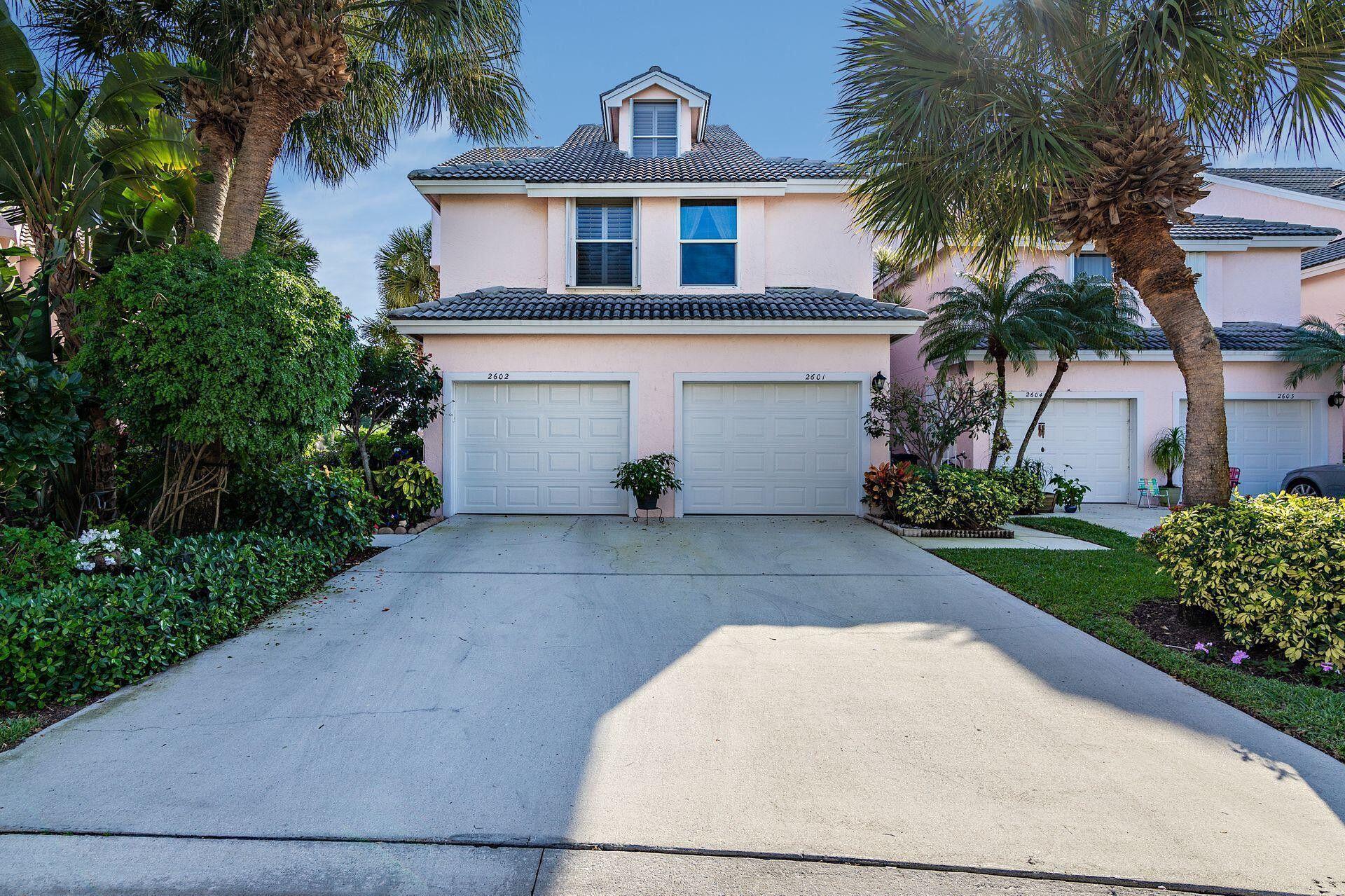 Available Seasonally or Annually. Walk to the turquoise waters of Jupiter Beach from this lovely 1ST FLOOR, 2 bedroom, 2.1 bath townhouse-style end unit condo in the gated, beachfront community of The Estuary. This beautiful updated residence is located on the ''back nine'' of the Jupiter Dunes Golf Course & nestled between DuBois Park, Jupiter's natural estuary & Atlantic Ocean. Relax on the impact glass lanai overlooking the golf action on the 15th fairway. Additional features include: renovated kitchen w/granite countertops; Primary suite w/walk-in closet & updated bath; impact windows; tiled floors; 1 car garage; southern exposure w/magnificent views of the golf course & lake. Walk to the beach, golf, Jupiter Inlet, parks & numerous waterfront restaurants. A perfect beach retreat!