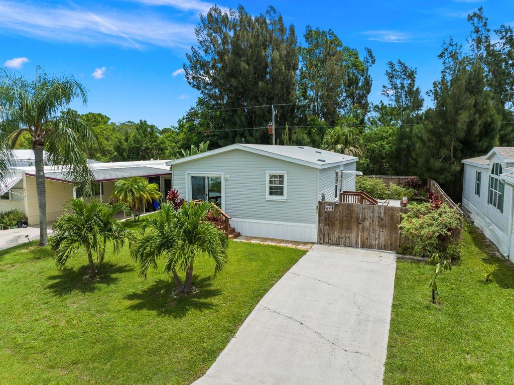 Photo of 8011 SE Skylark Avenue, Hobe Sound, FL 33455 (MLS # R11095877)
