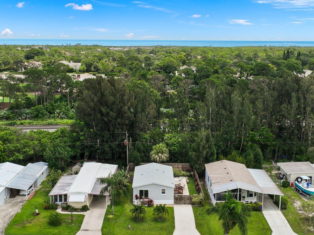 Photo of 8011 SE Skylark Avenue, Hobe Sound, FL 33455 (MLS # R11095877)