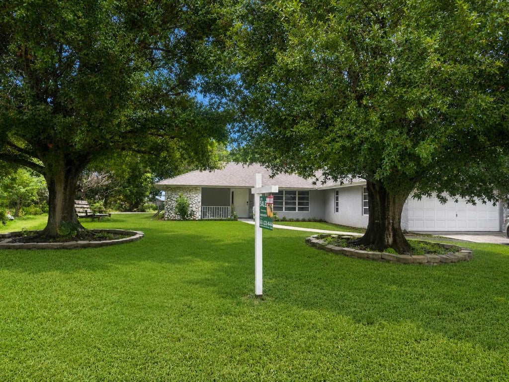 Photo of 2082 SE Hanford Road, Port Saint Lucie, FL 34952 (MLS # B26069744)