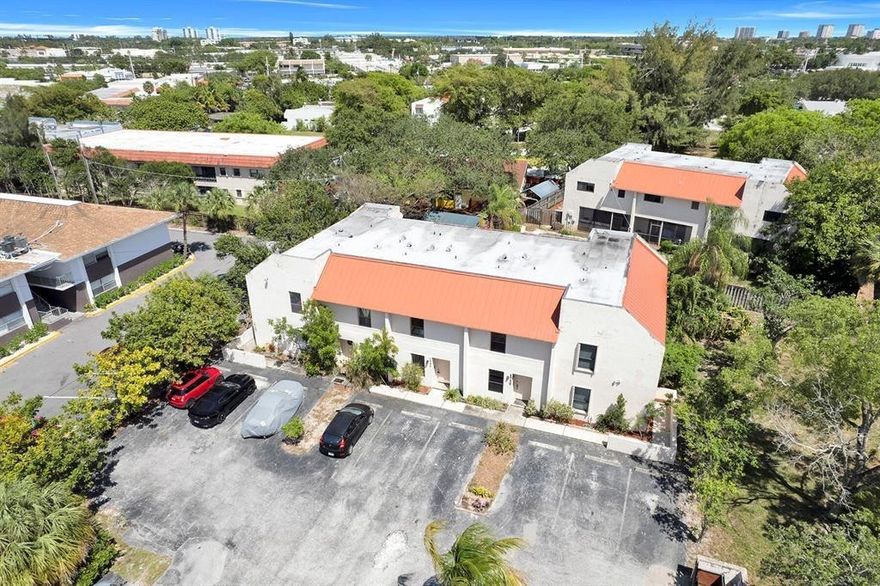 Price for a QUICK SALE. Newly renovated 2 Story Townhome in the heart of East Boca with a community pool! The 1st Floor include kitchen, living room, a half bathroom and a screened patio with storage. Upstairs is 2 bedrooms, 2 bathrooms, WASHER AND DRYER. New stainless steel appliances, granite counter top, new flooring thru out, hurricane windows. HOA covers exterior and ROOF INSTALLED 2018 Investor Friendly + Pet Friendly. Can rent immediately. Great location near FAU, I-95, the Beach and the mall. All ages welcome. All A Rated Schools! (JC Mitchell, Boca Mide + Boca High).2 parking spaces included