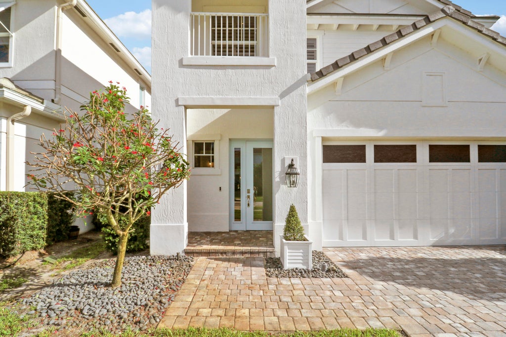 Photo of 125 Bonnette Hunt Club Lane, Palm Beach Gardens, FL 33418 (MLS # B26039718)