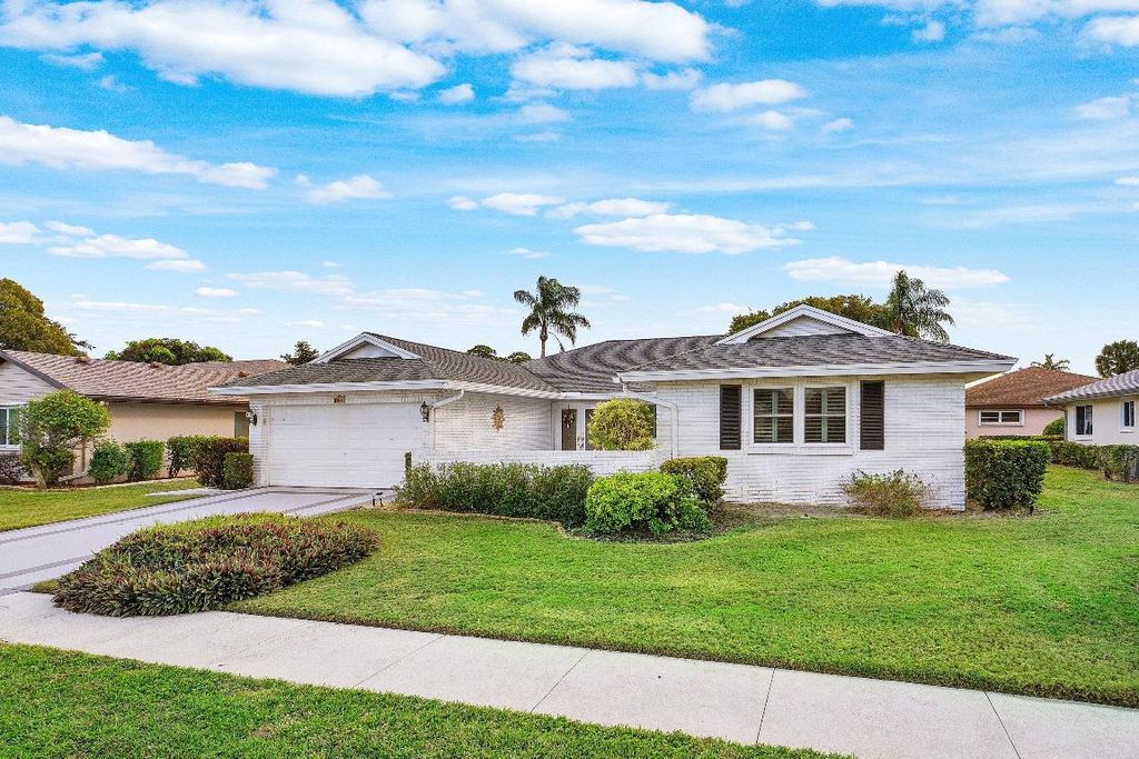 Photo of 10848 Greentrail Drive S, Boynton Beach, FL 33436 (MLS # R11156375)