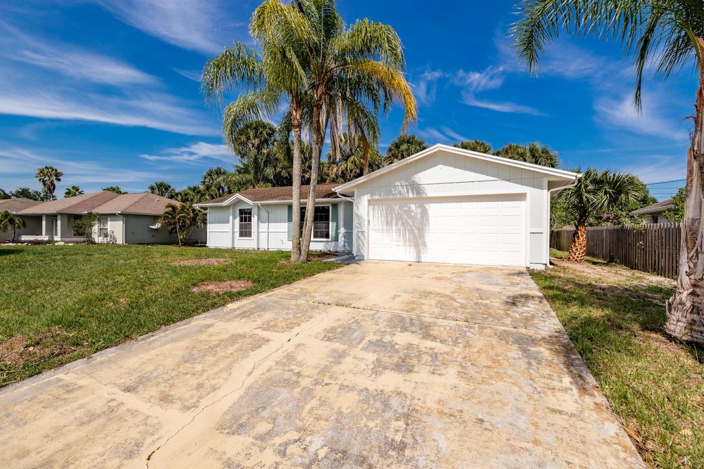 Photo of 4525 SW Van Dyke Street, Port Saint Lucie, FL 34953 (MLS # R11016500)